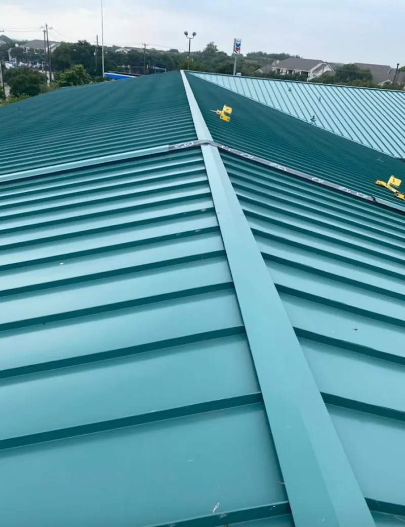 Green commercial metal roof ridge and valley for Metal Roof Repair in Lake Mathews
